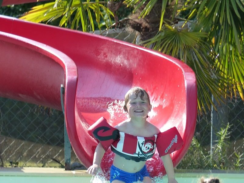 swimming pool and slide at a campsite in the Aude department